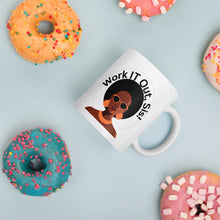 Load image into Gallery viewer, White mug with Black woman with gorgeous Afro, golden orange sunglasses, flat circular earrings and necklace with Work IT Out, Sis circled around her hair.